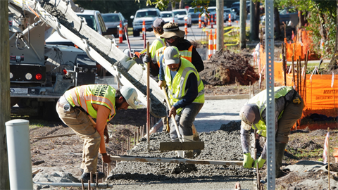 Crews begin pouring concrete for the Wrightsville Avenue sidewalk project