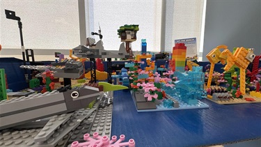 a colorful display of Legos shaped like beach animals