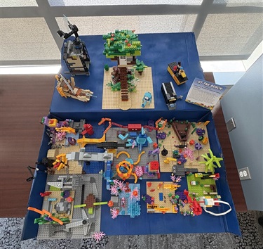 a colorful display of Legos shaped like beach animals