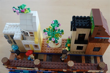 A LEGO Depiction of people walking on the Riverwalk