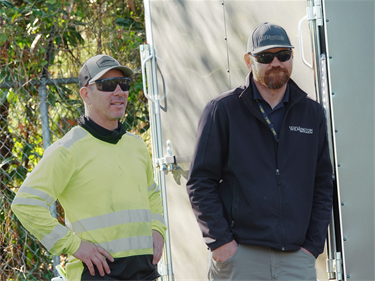Two Parks staffers waiting for the groundbreaking