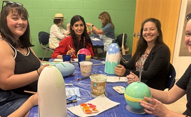 Kids painting buoys