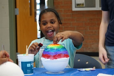 Kids painting buoys