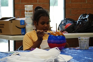 Kids painting buoys