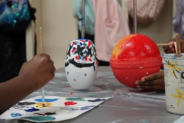 Kids painting buoys