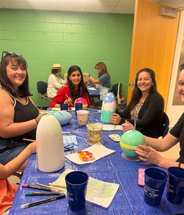 Kids painting buoys